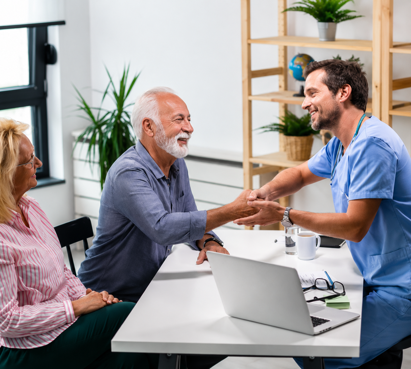 Retired couple reviewing Medicare plan options and enrollment periods with an insurance specialist in Brownwood, Texas